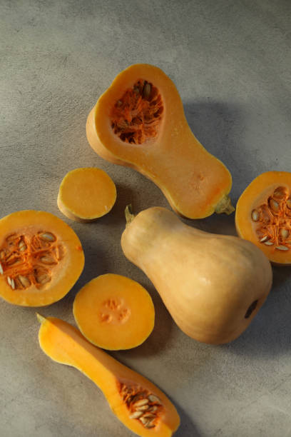 istock Cut sliced pumpkin on the grey background 1446742561