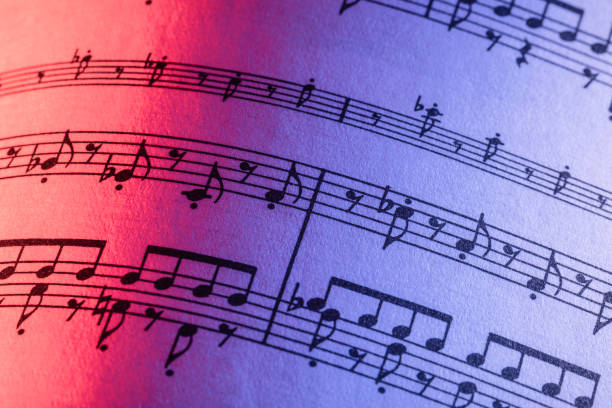 music sheet. photography made with colored filters in the flash - musical note treble clef sheet music key signature imagens e fotografias de stock