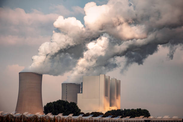 istock Power plant factory chimney emissions causing air pollution. 1446743726