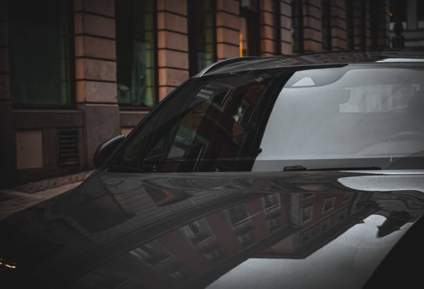 istock a car parked on the side of a building 1446745222