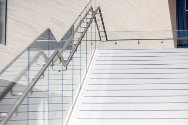 istock Modern stainless steel railing with glass panels, abstract background with copy space 1446748359