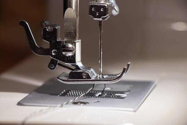 istock new sewing machine close-up at home, sewing 1446749428
