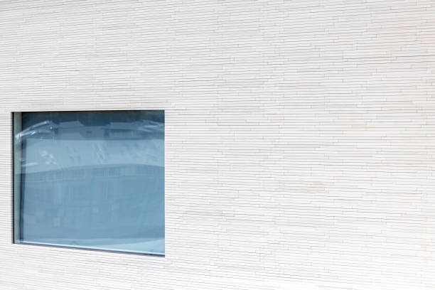 Closeup mode, new tiled wall with window, abstract background with copy space, full frame horizontal composition