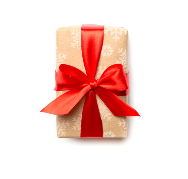 istock Gift box with red ribbon bow isolated on white, top view 1446751206