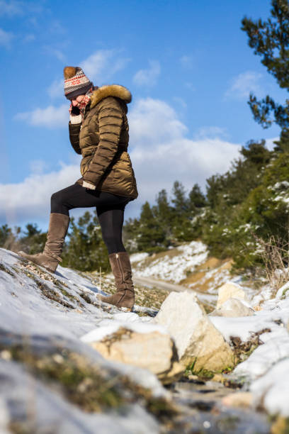 Woman In Snowy Forest