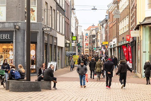 Arnhem, Netherlands, January 18, 2022; People shopping in the pleasant shopping street in the center of Arnhem.