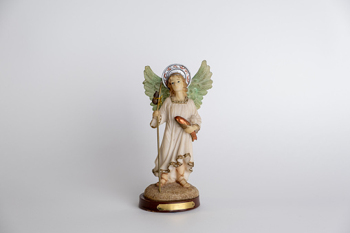 Saint Raphael Archangel statue isolated on white background
