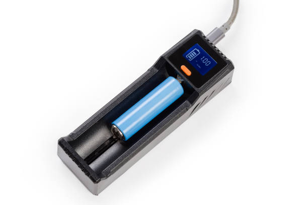 istock Battery charger for rechargeable batteries different types during battery charging 1446758905