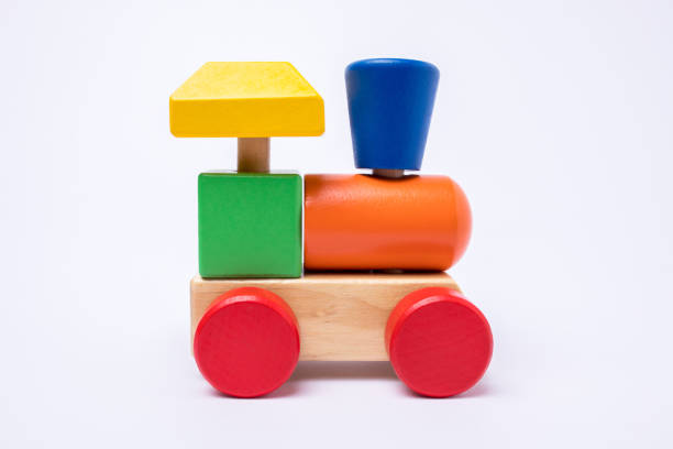 Front view of a wooden colorful train toy isolated on white background.