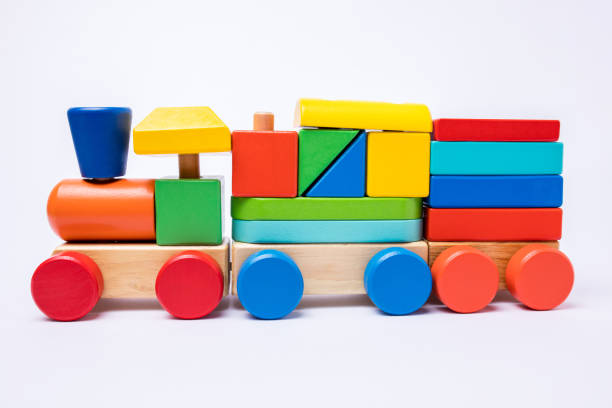 Front view of a wooden colorful train toy isolated on white background.