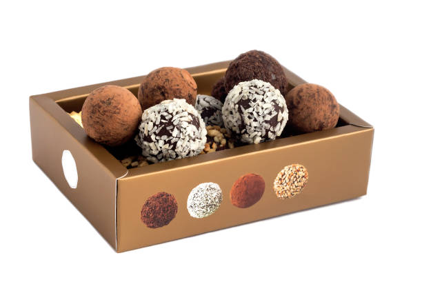 istock A set of chocolates in a gift box. Isolated on white background. 1446762577