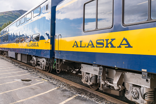 Seward, Alaska - September 1, 2022: An Alaska Railroad passenger train waits to depart the Seward train station.