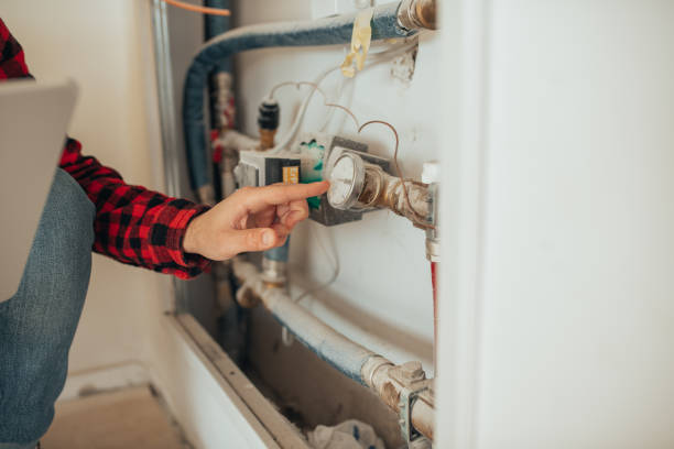 istock Heating engineer setting up heating for the first time in a new building 1446764224