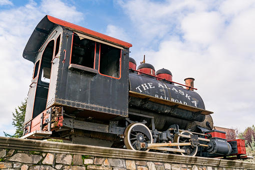 Anchorage, AK - September 4, 2022: Old antique Alaska Railroad Locomotive Number One outside of the Anchorage Railroad Depot