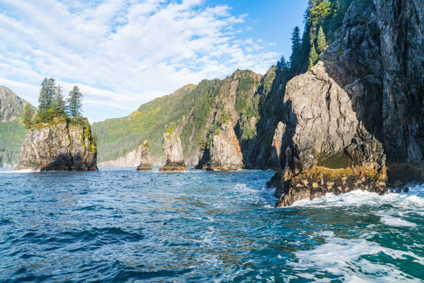 Mountains and sea stacks along the rugged coastline of Resurrection Bay near Seward, Alaska