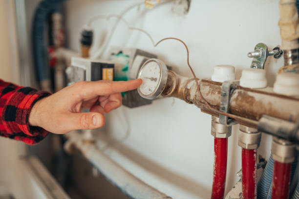 istock Close-up of a man checking heating installations 1446764500