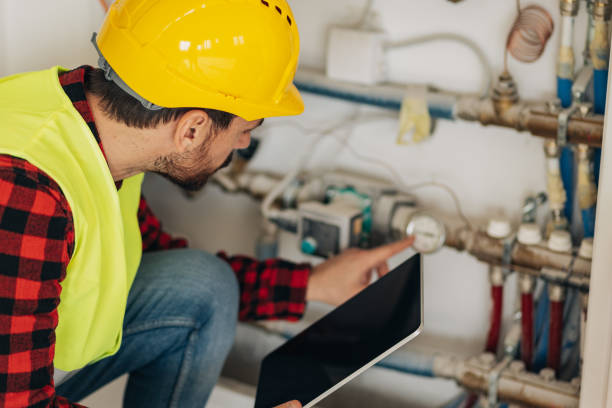 istock Heating engineer checking heated floor installations in a new building 1446765195