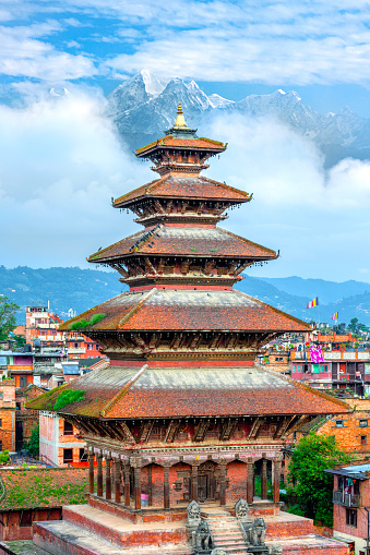Kathmandu, Nepal - December 03, 2014: Pilgrims visiting the Buddhist Boudhanath Stupa.