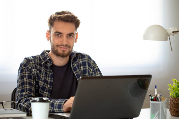 istock businessman at the office 1446773921