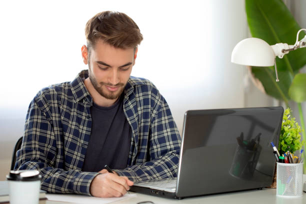 istock businessman at the office 1446773922