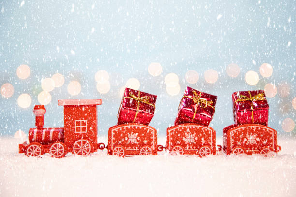 istock Red toy train with gifts 1446780547