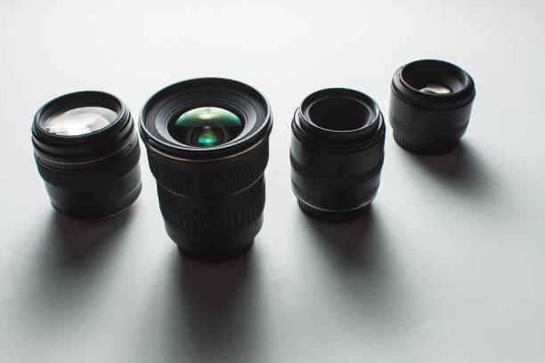 istock close-up view of a group of camera lenses on a white surface 1446781941