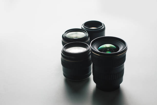 istock close-up view of a group of camera lenses on a white surface 1446781943