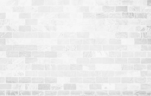 istock White grunge brick wall texture background for stone tile block painted in grey light color wallpaper modern interior and exterior and room backdrop design. Simple seamless pattern grid for backdrop. 1446782191