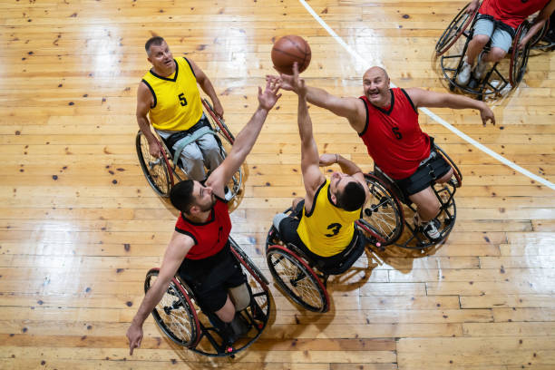 istock Adaptive sports men playing basketball 1446782241