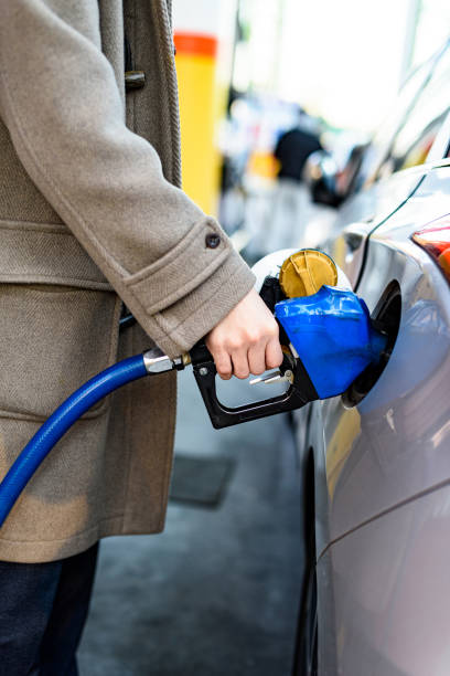 istock Korean Man Gasing at a Gas Station 1446783511