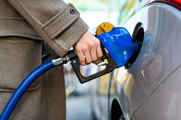istock Korean Man Gasing at a Gas Station 1446783526