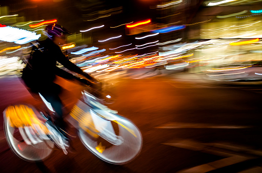 Blurred motion : Blurred motion : One person on a bike at night in toronto