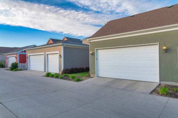 istock Garages exterior with sectional white garage doors at Daybreak, Utah 1446787204