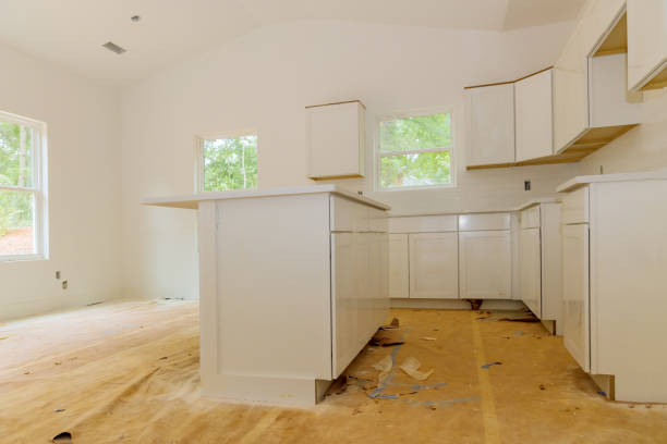 istock Installation of white kitchen cabinets in a new house 1446788274