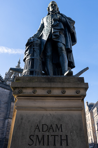 Adam Smith’s statue in the center of Edinburgh, Scotland