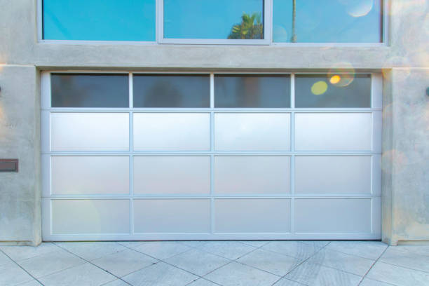 istock SIlver modern garage door exterior at Oceanside, California 1446800117