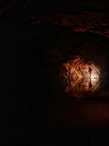 The lanturn is the only way to see inside the deep, dark cave.