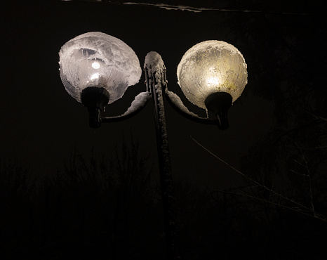 Beautiful view of street lamp in the starry night. Street lamp at night