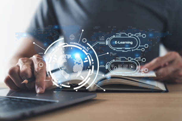 istock Businessperson or university student using laptop for online education learning or knowledge studying via internet at home. Distance learning and training course or class or e-learning via cyberspace 1446808950