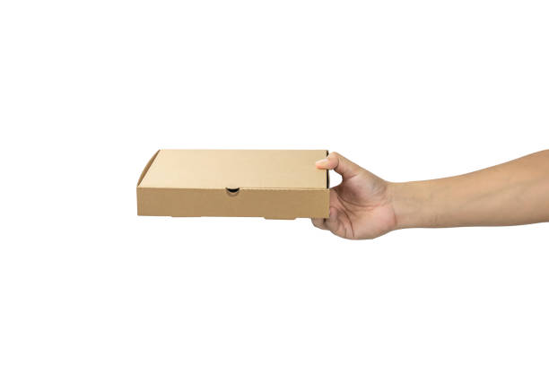 istock Hand holding pizza box isolated on white background with clipping path. 1446809267