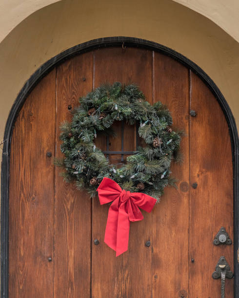 istock Christmas Wreath on a Door 1446809896