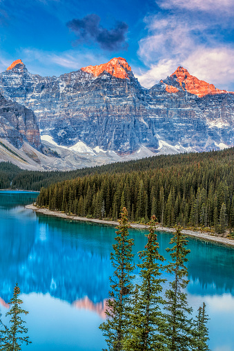 Morning alpenglow over Moraine Lake in Banff National Park in the Canadian Rockies