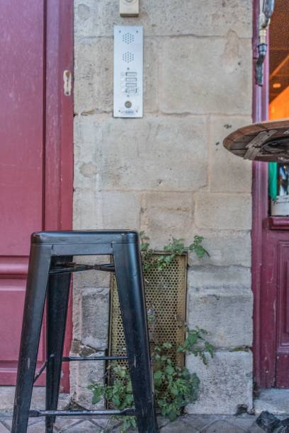 istock Vertical of a black stool in front of bar 1446828291