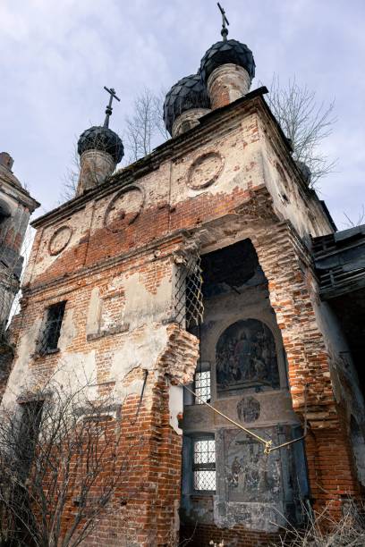 istock Vertical low-angle shot of a damaged, abandoned church 1446830548