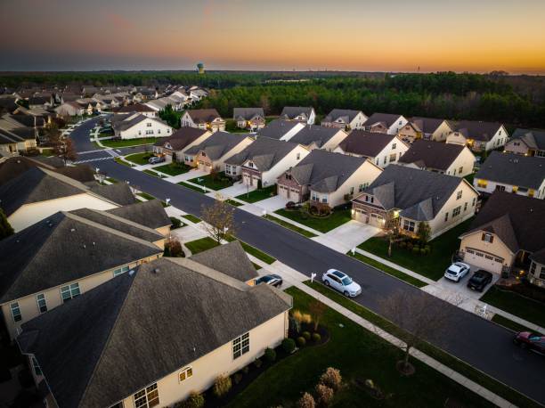 Aerial view of a typical American residential area in New Jersey at sunset An aerial view of a typical American residential area in New Jersey at sunset cherry hill nj stock pictures, royalty-free photos & images