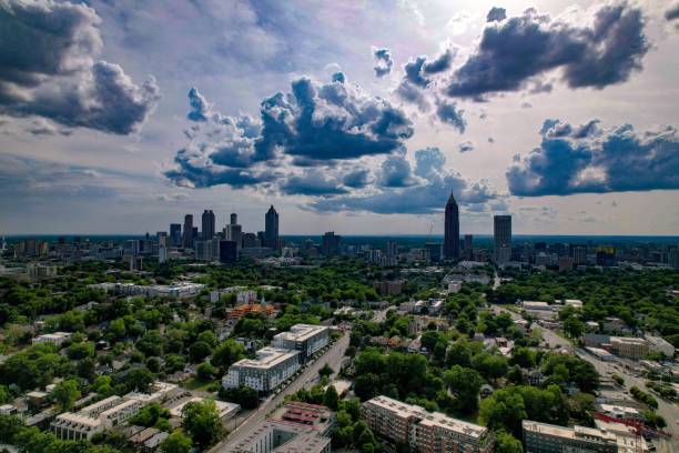 istock Cityscape with cloudy blue sky above 1446831286