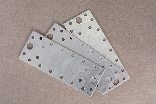Metal plate for construction work. The assortment of the construction store.