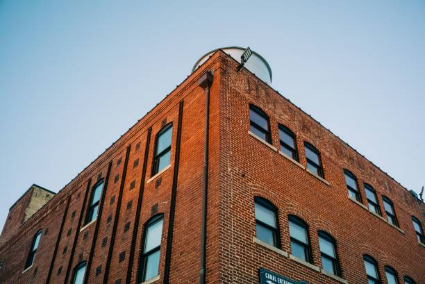istock Low angle shot of a brick building with many windows 1446835327