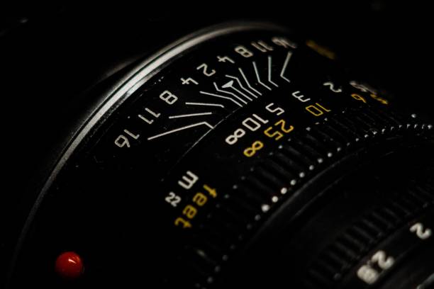 A closeup shot of a camera lens with digits