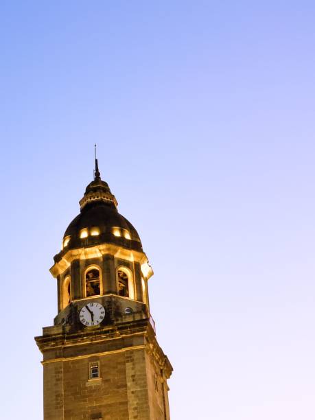 istock Vertical shot of a clock tower against a clear blue sky 1446835628